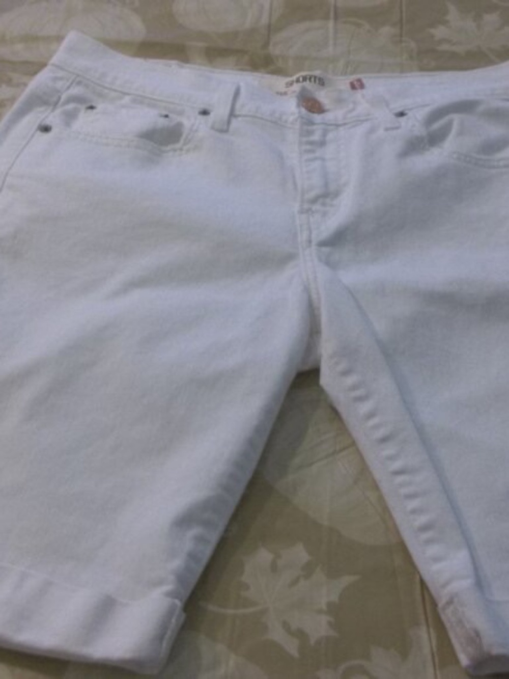 Ladies size 8 Levi white jean shorts